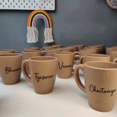 A batch of our custom-engraved bamboo husk mugs ready to go. They are a popular choice for corporate teams and as thoughtful, sustainable personal gifts.