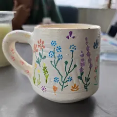 A beautiful, hand-built mug painted with delicate wildflowers. This piece shows how you can create functional art that's perfect for your morning chai or as a special handmade gift.