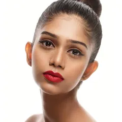 A slight variation on the classic headshot, the head tilt adds a bit of personality and inquiry to the expression. This shot provides another option for a model's portfolio, showing subtle changes in posing.