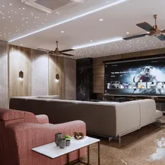 Movie nights get a major upgrade in this cozy home theatre. The design features a large projection screen, comfortable L-shaped sofa, and starlight ceiling for a truly cinematic atmosphere.