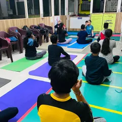 Our shooters participating in a group yoga session on International Yoga Day, focusing on breathing and mindfulness to enhance their concentration on the range.