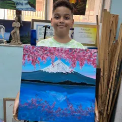A beautiful rendition of Japan's Mount Fuji, complete with cherry blossoms. In my classes, we travel the world on our canvases.
