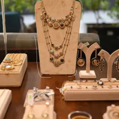 A stunning display of our layered necklaces and earrings at our private pop-up at Asper. We curate our displays to highlight the versatility and artistry of each piece.