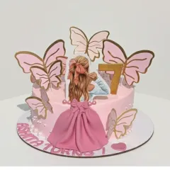 A fairytale cake for Ashita's 7th birthday. This chocolate truffle cake is decorated with a beautiful girl-in-a-dress topper and surrounded by pink butterflies.