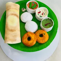 A top-down view of my hyper-realistic breakfast platter cake. Even the tiny cup of filter coffee is made of sugar. It's a perfect example of how I can turn any idea into an edible work of art.
