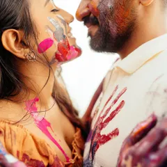 The beautiful, messy result of a creative painting session in the studio. This close-up captures the playful intimacy and vibrant colors of their love.