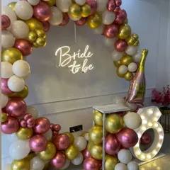 A close-up view of the 'Bride to be' balloon decor, highlighting the mix of balloon sizes and colors that create a rich, textured look.