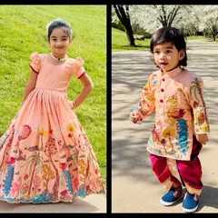 I love creating coordinated outfits for siblings. Here, a sister in a hand-painted peach gown and her brother in a matching kurta-dhoti set look absolutely perfect for a family celebration.