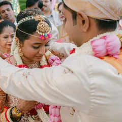 A candid moment during the garland exchange, a significant ritual in many Indian weddings. I ensure the decor enhances these moments without overwhelming them.