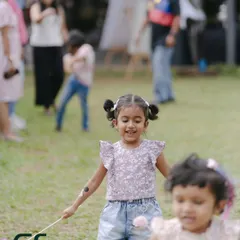 Pure, carefree joy. I love seeing kids running and playing on the lawn with pinwheels. It’s what my open green space is for.