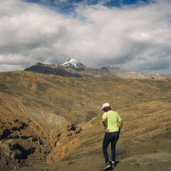 A poster-style image from the majestic mountains of Spiti. This shot captures the vast scale of the landscape and the feeling of being a small part of something immense.