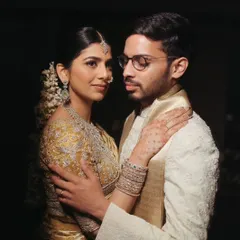An intimate portrait of the couple, capturing their deep connection and the elegance of their wedding attire.