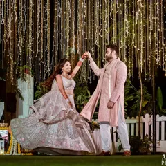 A fairytale twirl under a canopy of lights. This Sangeet night portrait is all about movement, joy, and the magical atmosphere of the celebration.