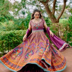 A twirl of happiness. This bride's offbeat Mehendi look is bursting with colors, joy, and celebration. I love creating unique and radiant styles like this.