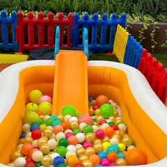 A close-up of the inflatable ball pit that comes with its own small slide. This is a favorite piece of equipment for toddlers at any event.