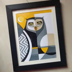 This geometric owl was painted with acrylics, blending sharp lines and patterns with a modern color palette of yellow, grey, and black. It's a piece that helped me break an art block and resulted in a striking, contemporary artwork.