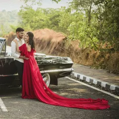 For couples who love a classic vibe, we incorporate elements like vintage cars to add timeless charm to your photoshoot. This pre-wedding session combined a bold red gown with a classic Chevrolet for an unforgettable look.