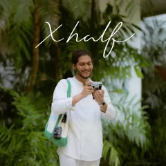 A candid shot from the Fujikina Cebu camera festival. This image captures the joy of using the new X half camera, blending the product naturally into the event's creative atmosphere.