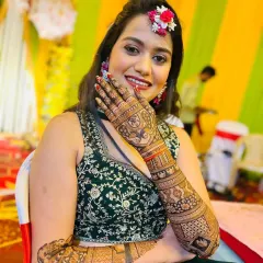 A smiling client at her mehandi function. It's a joy to be part of such special celebrations and to add to the beauty of the day with my art.