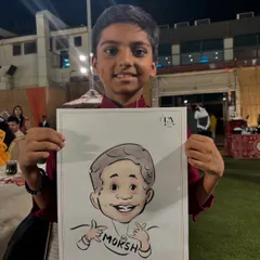 This young man is all smiles with his caricature, which captures his playful personality. A great return gift idea for birthday parties.