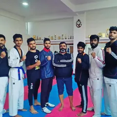 Posing together after a team training session. This is our group of dedicated athletes who push each other to be better every day.