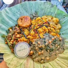 Holding up a serving of our NCF khechri, ready for the Kang (Ratha Yatra) festival. It's a taste of home, right here in the national capital.