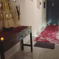 Welcome to your private getaway. For a perfect first impression, especially for a birthday or anniversary surprise, I can set up the entrance with a path of rose petals and candles.