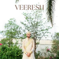 A stylish portrait of the groom, Veeresh, looking calm and ready for his wedding day.