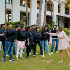 Capturing a moment of instruction and teamwork during an outdoor corporate event. These candid shots are great for internal communications and social media.