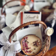 Not just gifts, but curated moments. These small wicker baskets, each holding a botanical candle, premium chocolate, and a personalized note, are perfect for thoughtful, small-scale client appreciation.
