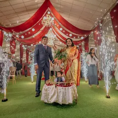 A grand entrance for the birthday boy at his 'Cirque Royale' party. The dramatic red draping and sparkling pyrotechnics create a truly majestic moment, making the family feel like the stars of the show.
