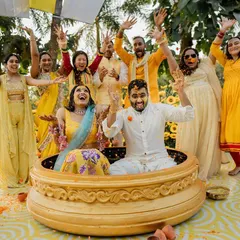 A Haldi ceremony should be full of joy and laughter. We created this incredibly fun setup with a giant 'urli' for the couple, surrounded by a field of sunflowers, ensuring the photos and memories would be as vibrant as the day itself.