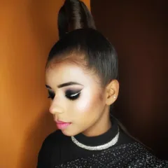The final look with the graphic smokey eye and a sleek high ponytail. This is perfect for a cocktail party or a fashion-forward event.
