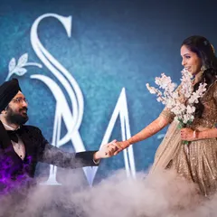 A dreamy first dance on a cloud of smoke. Suntej and Manjit's reception was a fairytale scene.