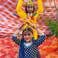 We love celebrating our culture with special themed performances. Here, our talented students are dressed as Radha and Krishna for a Janmashtami dandiya dance, creating beautiful memories while learning.