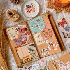 A beautiful journal spread created using the "Fluttering Butterflies" journaling kit. This kit is perfect for creating delicate and whimsical pages.