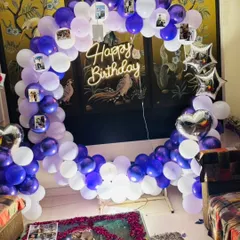 To make this 18th birthday extra special, I created a large circular balloon arch and personalized it by attaching cherished photo memories. It’s a beautiful backdrop for photos and makes the celebration feel deeply personal.