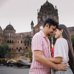 A quiet embrace amidst the motion of Mumbai. This shot, taken in front of the historic CST station, freezes a personal moment in time, contrasting the couple's stillness with the city's vibrant energy.