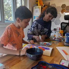 A close-up of the creative process. Here, students are learning about color mixing and brushwork. My classes are very hands-on, allowing you to learn by doing in a supportive setting.