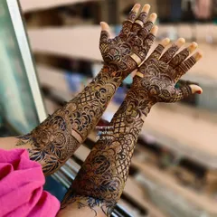 A stunning view of a full-arm bridal mehendi, perfect for making a statement.