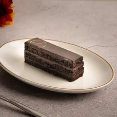 This is our vegan Opera pastry. I've recreated this complex French classic with plant-based ingredients so everyone can enjoy its rich coffee and chocolate flavours.