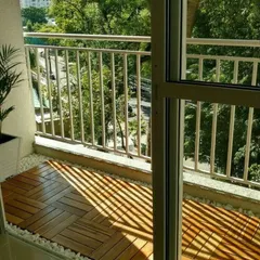 Even on a bright, sunny day, these wooden deck tiles provide a clean and sophisticated look. They are a great way to cover old concrete or tile floors for an instant upgrade.