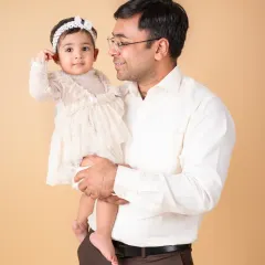 A sweet moment between a father and his daughter. These simple interactions create the most heartfelt photographs.