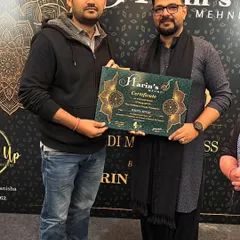 I am committed to constantly learning and perfecting my art. Here I am receiving a certificate of participation from the renowned mehndi master, Harin Dalal.