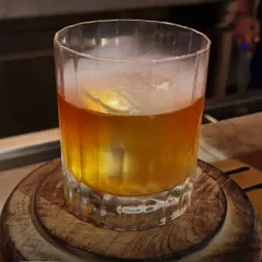 Experience whiskey artistry where smoke swirls and flavors deepen. This Butter Old Fashioned is infused with smoke for a smooth, complex, and unforgettable taste.