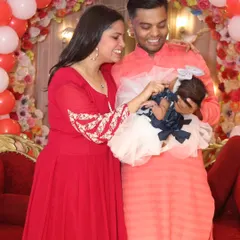 A candid, heartwarming photo of the new parents adoring their baby girl. These are the quiet, emotional moments that I strive to capture.