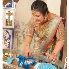 We are always honored when clients like Bhavs give us creative freedom. For this special occasion, we created a blouse with intricate cutwork and French knots on a sheer sleeve, balancing simplicity with opulence.