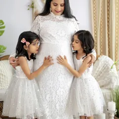 The excitement of expecting a new arrival, shared with the older siblings. Maternity sessions with the whole family are a wonderful way to document this special time.