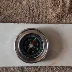 A simple compass is one of the most important tools during a Vastu site visit. Accurately determining the cardinal directions is the first step to creating a precise Vastu map of a property and ensuring all remedies are placed correctly.