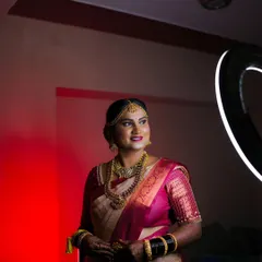 A beautiful bridal portrait taken with creative lighting. The ring light creates a lovely circular catchlight in her eyes, making the photo pop.
